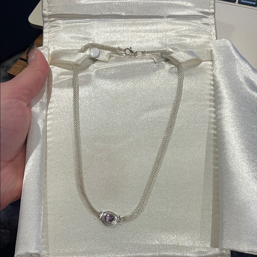 Elegant Silver Necklace with Purple Gem